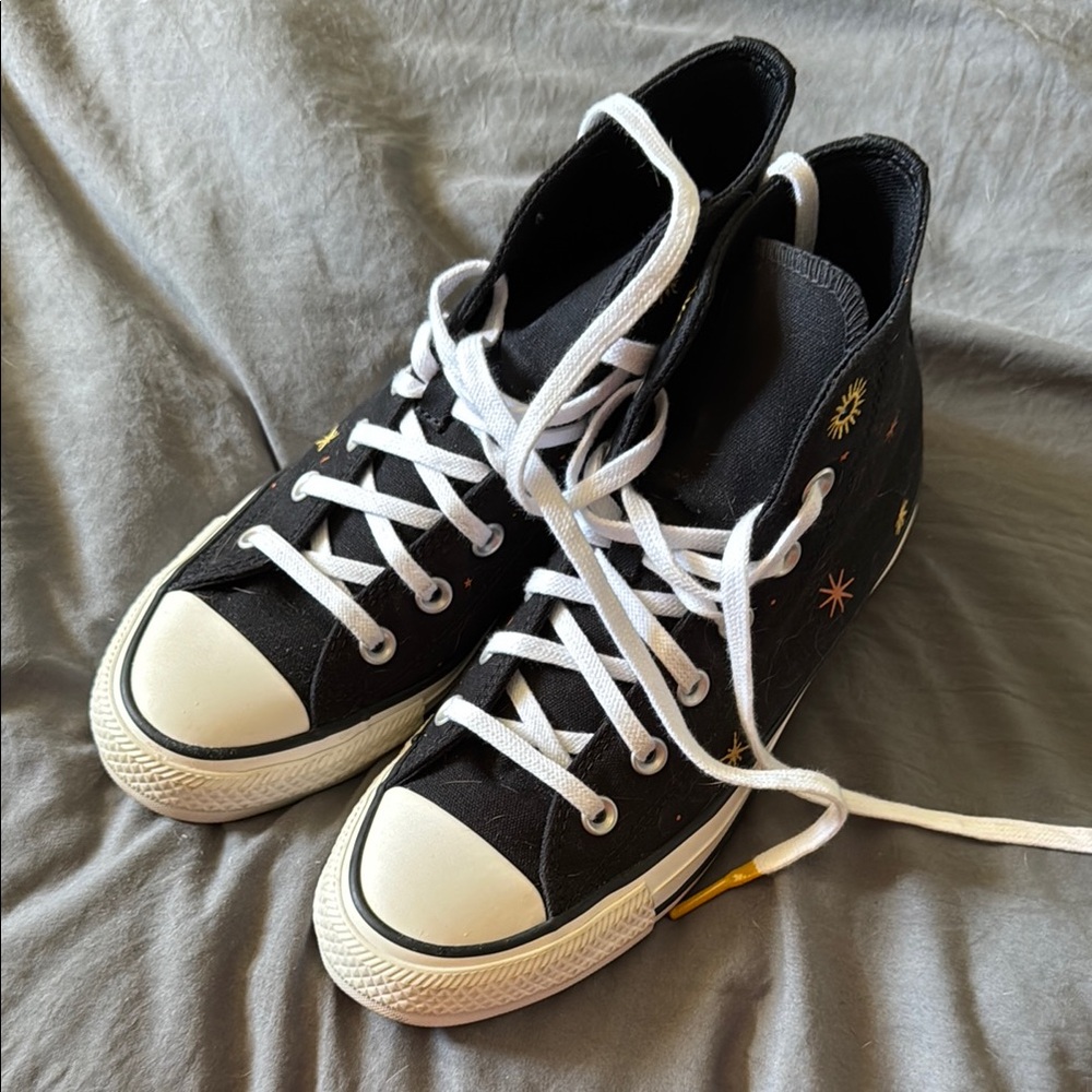 Converse Black High-Tops with White and Yellow Accents